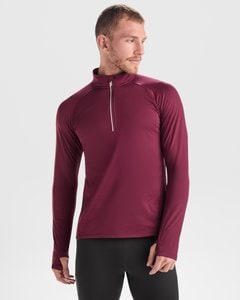 Roly SU1031 - ESTAMBUL Brushed technical sweatshirt with a raglan sleeve and a half zip inverted design featuring a reflective detail